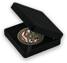 A black velvet finish covers the outside of the box while the inside is a recessed 1 9/16th inch circle cutout that will fit standard challenge coins. Velvet Case