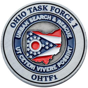 Silver challenge coin for Ohio Task Force 1 Urban Search and Rescue featuring the state of Ohio with a flag design.