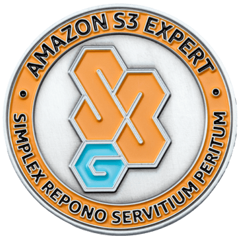 A silver challenge coin with orange and blue enamel featuring the text Amazon S3 Expert and Simplex Repono Servitium Peritum.