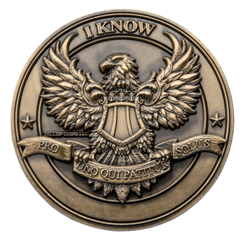 Antique bronze challenge coin featuring a central eagle with outstretched wings, a shield, and Latin inscriptions on banners.