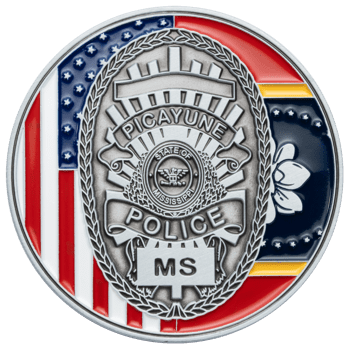 Silver-finished Picayune Police challenge coin featuring a police badge emblem over a background of the American and Mississippi state flags.