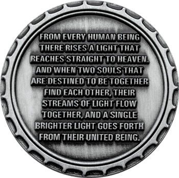 Antique silver challenge coin featuring an engraved inspirational quote about united souls and a notched bottle cap style rim.