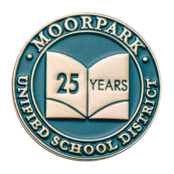 Circular lapel pin for Moorpark Unified School District featuring a teal background, gold text, and an open book icon with 25 years.