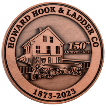 Antiqued copper 150th anniversary medallion for Howard Hook & Ladder Co featuring a vintage building, fire wagon, and dates 1873-2023.