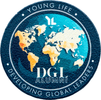 Young Life DGL Alumni challenge coin featuring a world map design and text that reads Developing Global Leaders.
