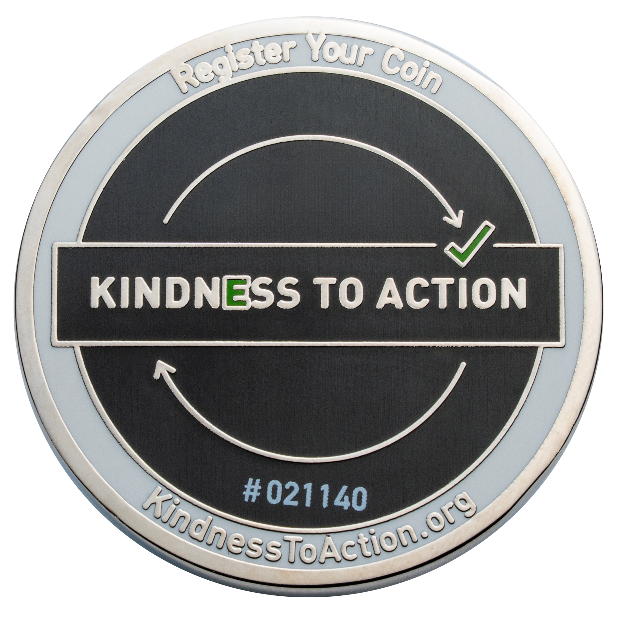 Kindness To Action challenge coin featuring a black textured center, circular arrows with a green checkmark, and a white border.
