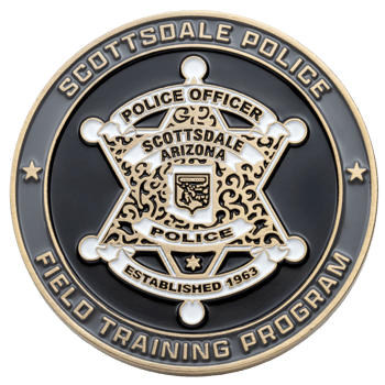 Circular challenge coin for Scottsdale Police Field Training Program featuring a gold and white six-pointed star badge on a black background.
