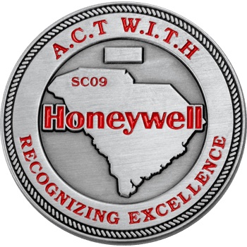 Brushed silver challenge coin featuring Honeywell logo over a South Carolina outline with red enameled text reading A.C.T W.I.T.H and Recognizing Excellence.