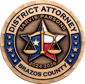 District Attorney Jarvis Parsons Brazos County challenge coin featuring scales of justice over a Texas star design.