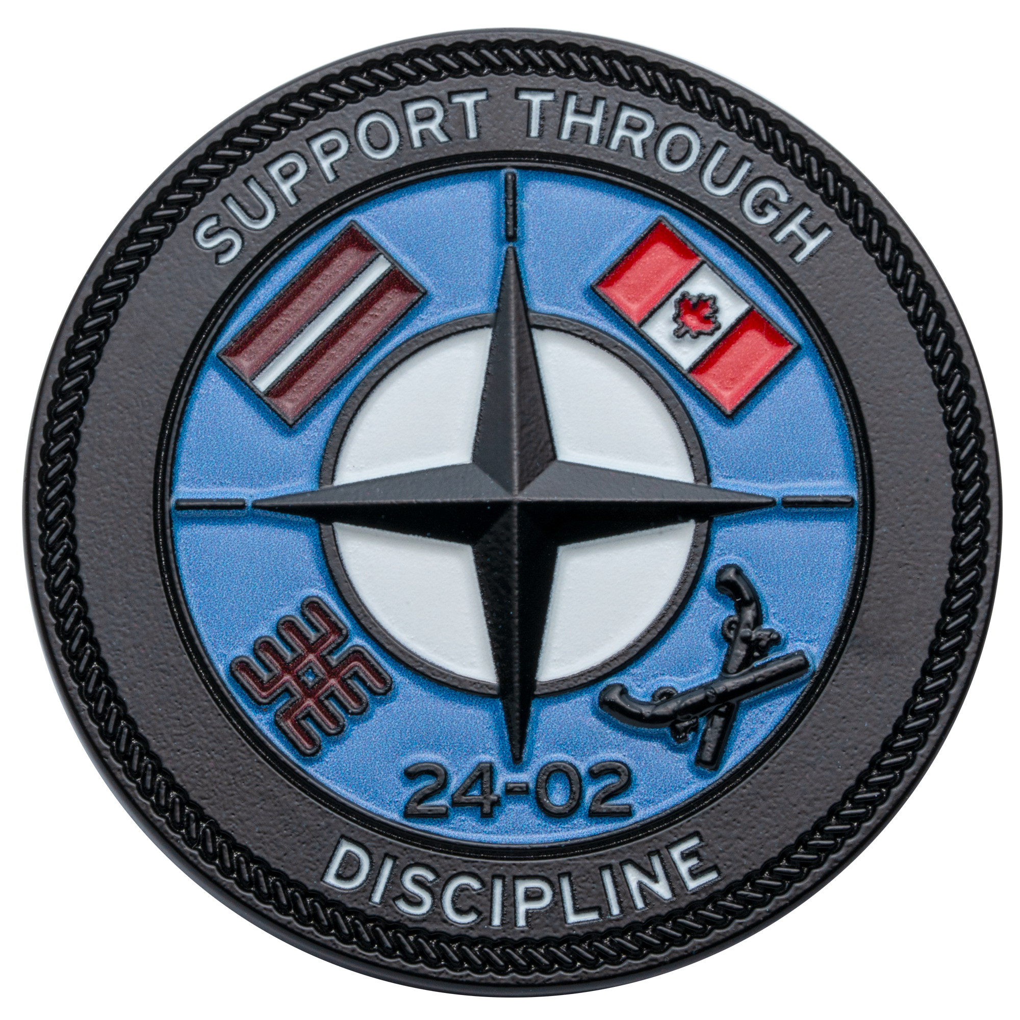Circular challenge coin featuring the NATO star emblem, Latvian and Canadian flags, and the text Support Through Discipline and 24-02.