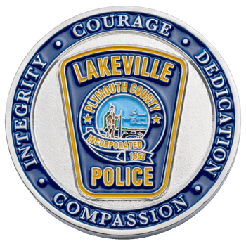 Circular silver challenge coin for Lakeville Police Plymouth County featuring a blue and yellow crest with integrity, courage, dedication, and compassion text.