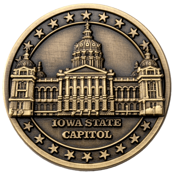 Antiqued gold coin featuring a detailed relief of the Iowa State Capitol building surrounded by stars.