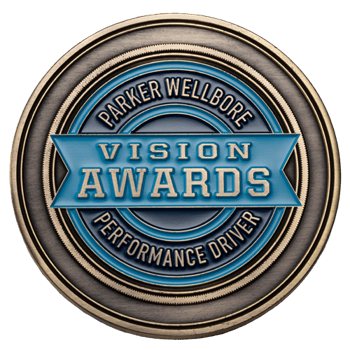 Antiqued bronze and blue enamel challenge coin for the Parker Wellbore Vision Awards Performance Driver.