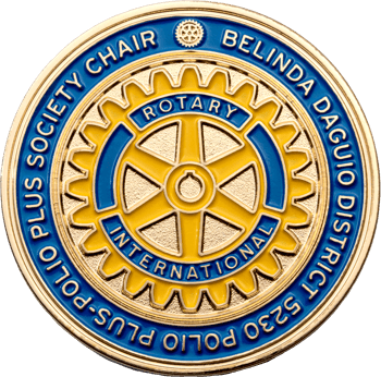 Rotary International challenge coin featuring a yellow and blue gear wheel logo surrounded by blue enamel text for District 5230.
