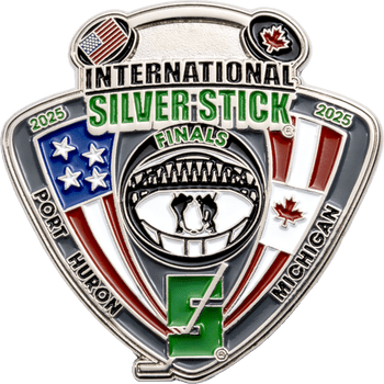 Shield-shaped enamel lapel pin for the 2025 International Silver Stick Finals in Port Huron, Michigan, featuring US and Canadian flags and hockey motifs.