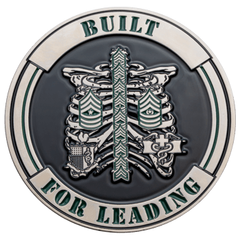 Circular challenge coin featuring a silver ribcage and spine with military rank insignia and medical emblems on a black background.