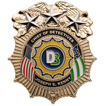 Gold eagle-topped shield challenge coin for Chief of Detectives Joseph E. Kenny featuring DB initials and three silver stars.