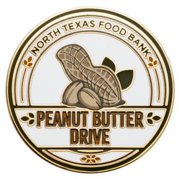 Circular challenge coin for the North Texas Food Bank Peanut Butter Drive featuring a gold and enamel peanut illustration on a white background.